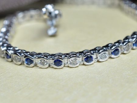 Enchanting 1.00 CT Round Cut Blue Sapphire and Diamond Color Stones Bracelet in 14KT White Gold Fashion