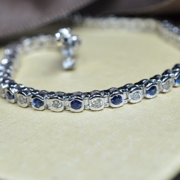 Enchanting 1.00 CT Round Cut Blue Sapphire and Diamond Color Stones Bracelet in 14KT White Gold Fashion