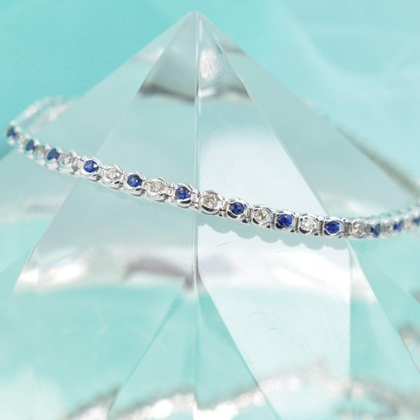 Enchanting 1.00 CT Round Cut Blue Sapphire and Diamond Color Stones Bracelet in 14KT White Gold Fashion