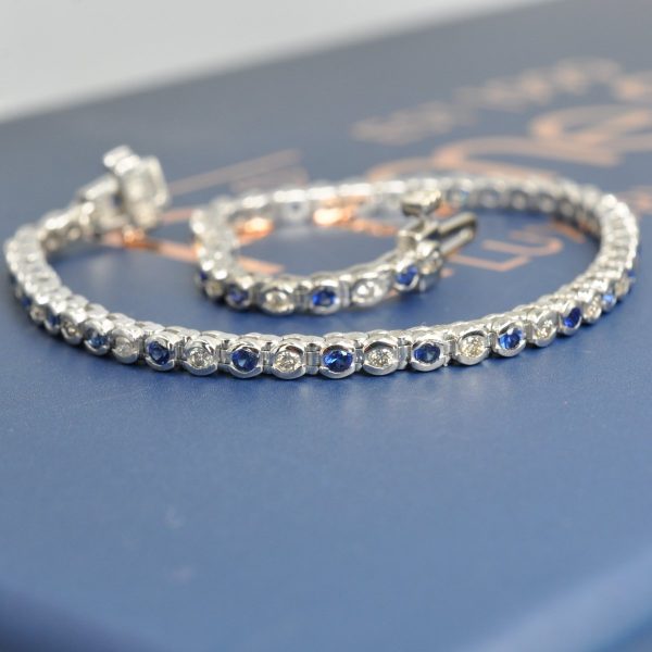 Enchanting 1.00 CT Round Cut Blue Sapphire and Diamond Color Stones Bracelet in 14KT White Gold Fashion